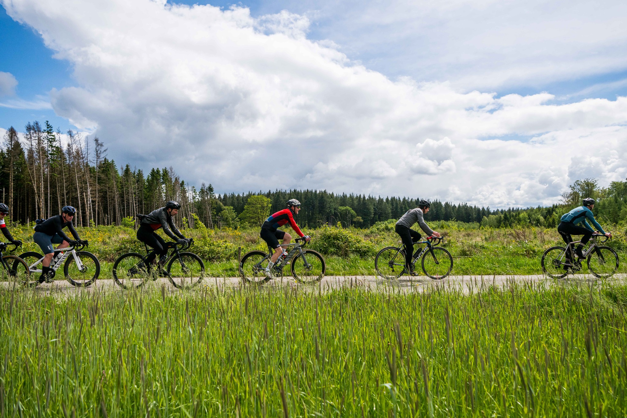 Cyclists on a country road during Belgium Bike Fest